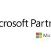 Software: A imagem exibe o emblema Gold Microsoft Partner, destacando o icônico logotipo da Microsoft acompanhado por quatro quadrados coloridos à direita e 